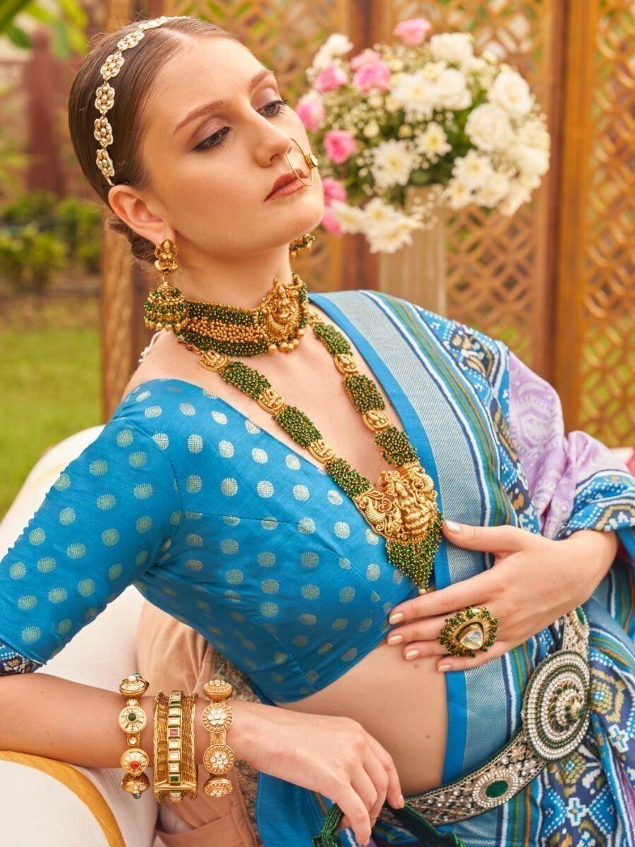 Awesome Lavender Patola Printed Silk Sangeet Wear Saree - Zeel Clothing