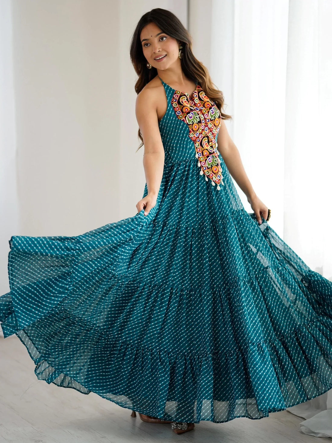 Awesome Teal Blue Laheriya Printed Georgette Navratri Special Gown