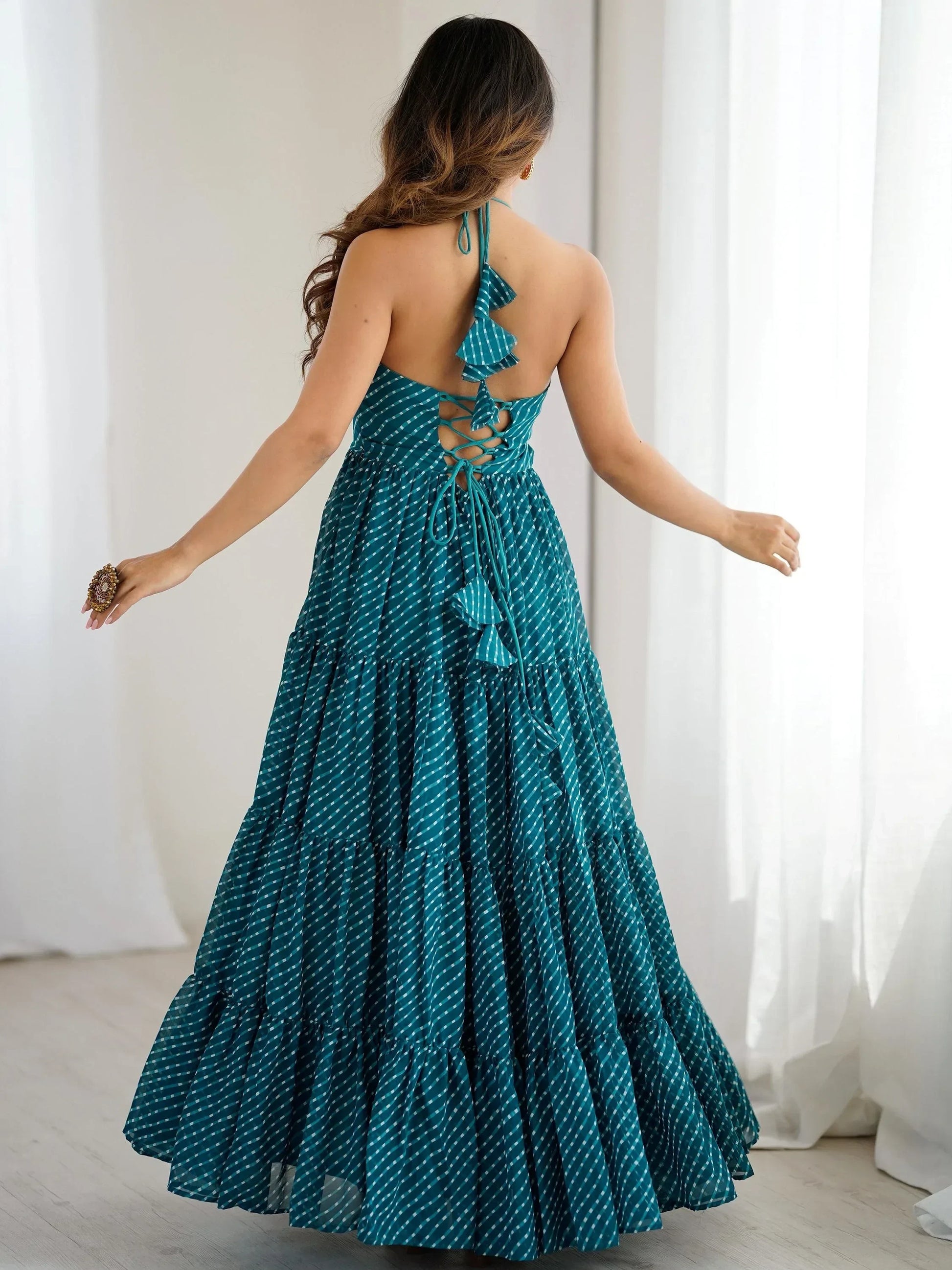 Awesome Teal Blue Laheriya Printed Georgette Navratri Special Gown