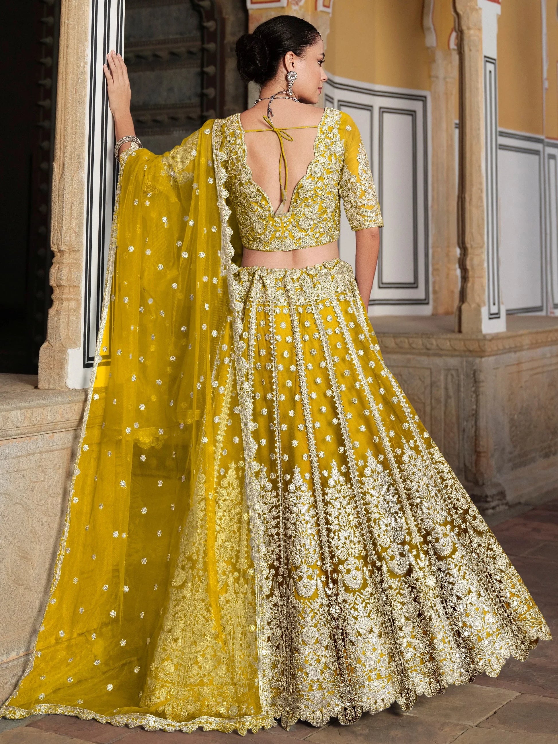 Awesome Yellow Embroidered Net Haldi Wear Lehenga Choli With Dupatta