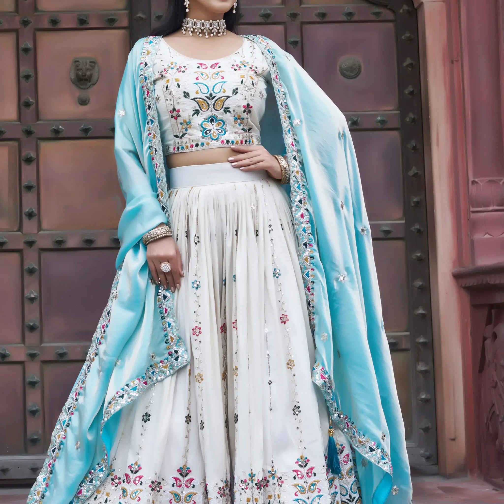 Rich Off-White Thread Embroidery Tissue Bridesmaid Lehenga Choli With Blue Dupatta