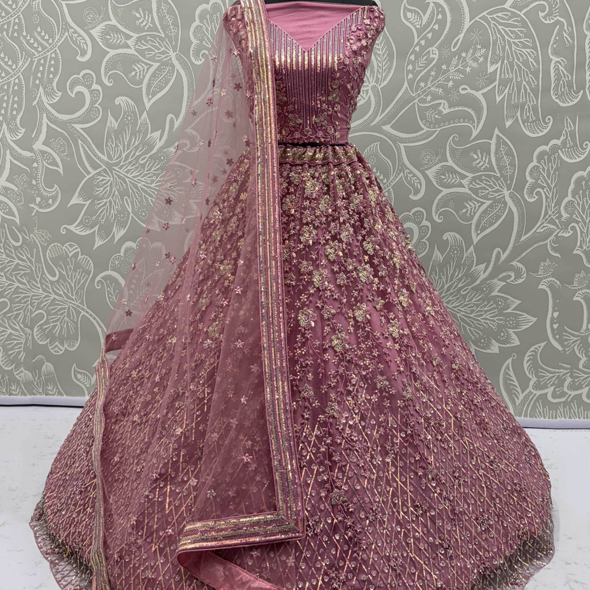 Shiny Pink Multi Thread Work Net Engagement Wear Lehenga With Blouse