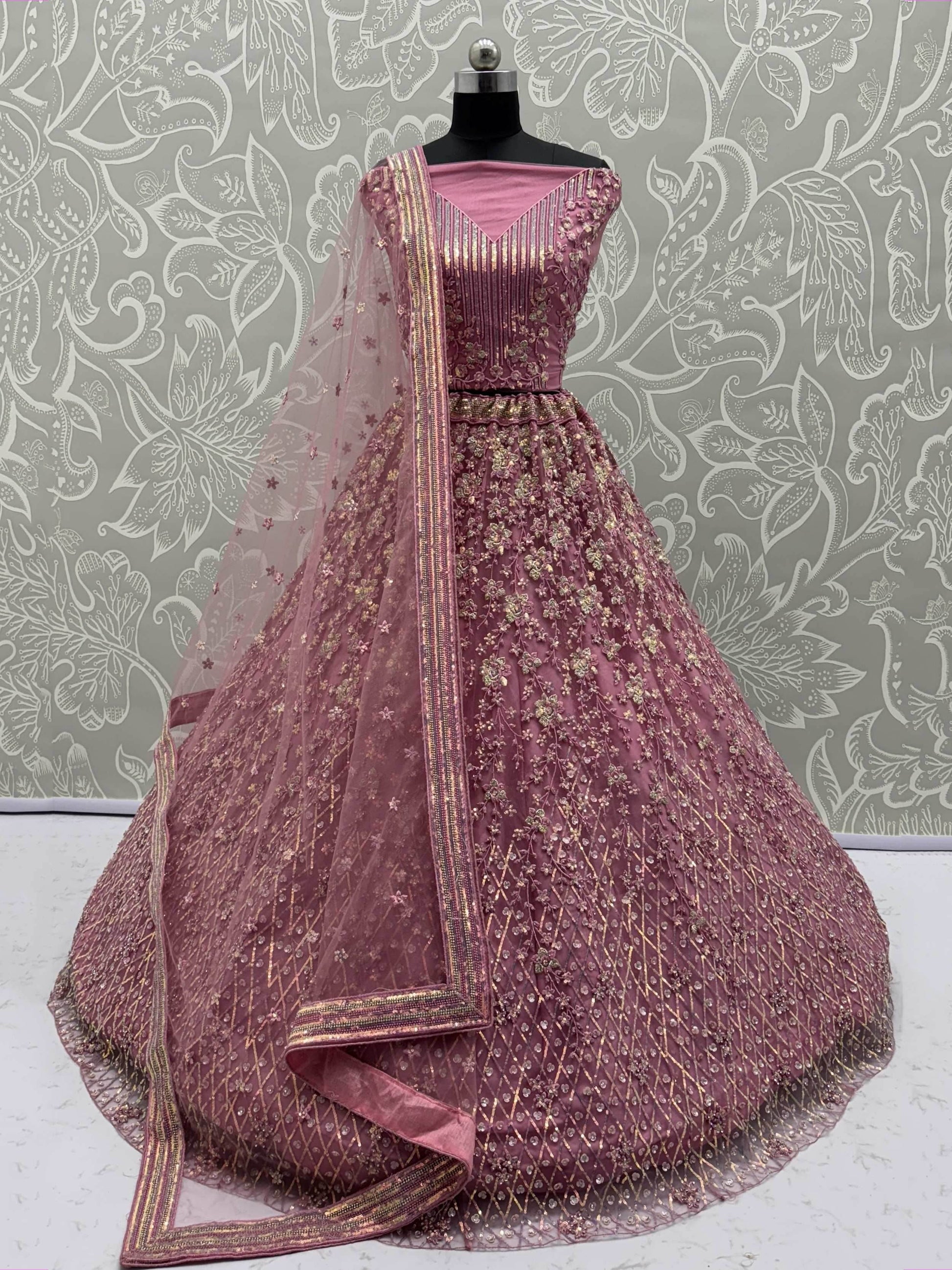 Shiny Pink Multi Thread Work Net Engagement Wear Lehenga With Blouse