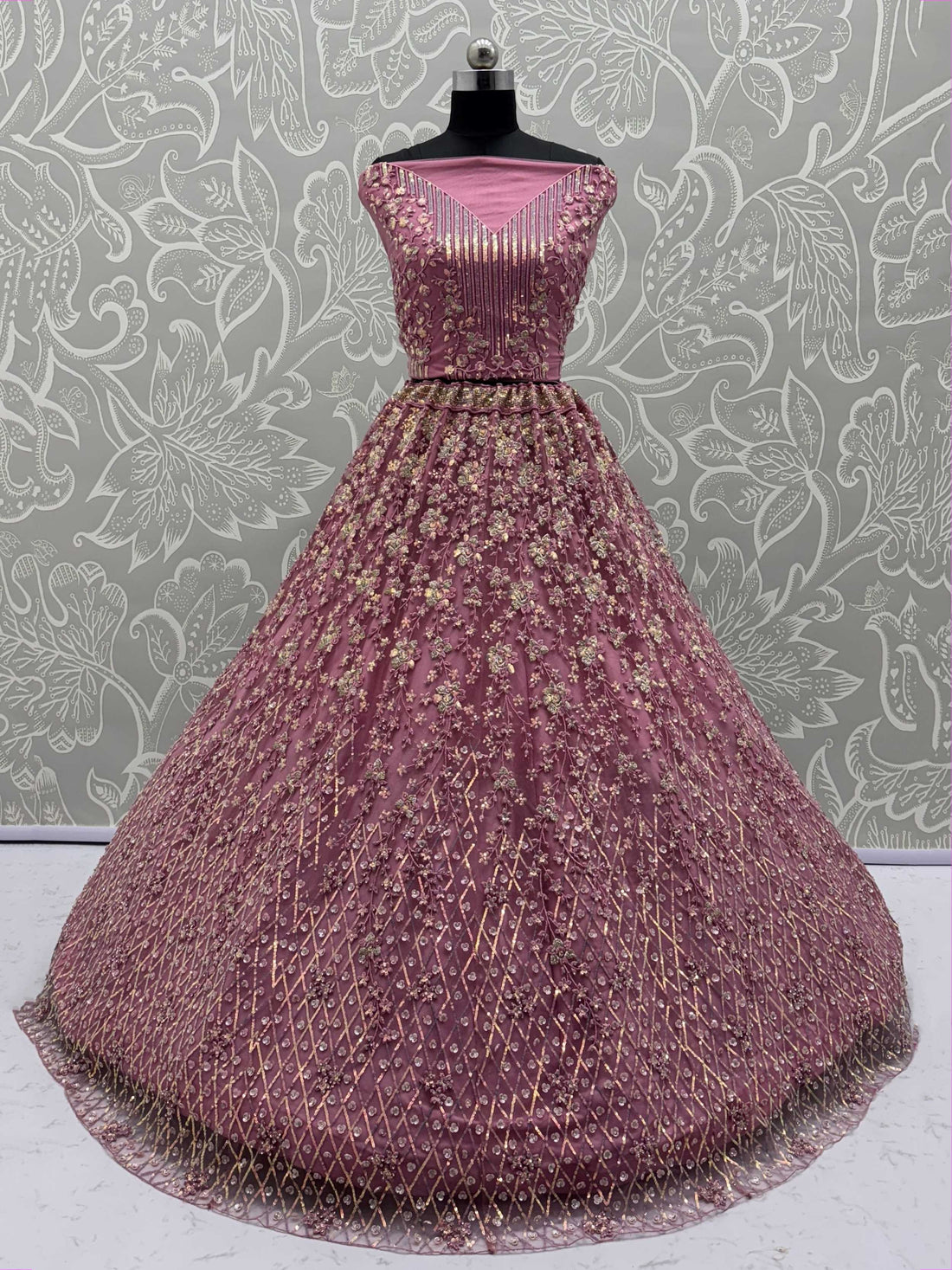 Shiny Pink Multi Thread Work Net Engagement Wear Lehenga With Blouse