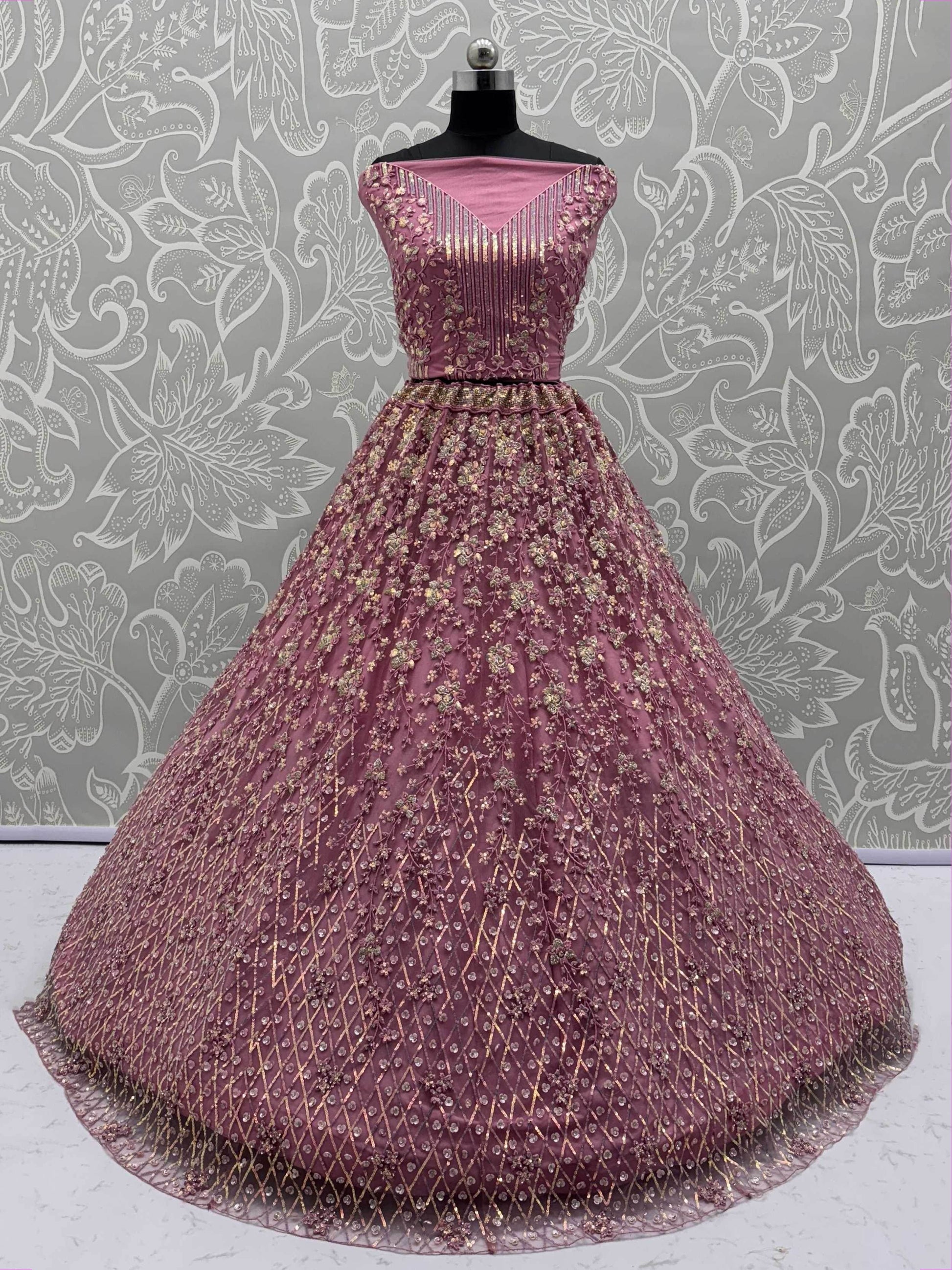Shiny Pink Multi Thread Work Net Engagement Wear Lehenga With Blouse