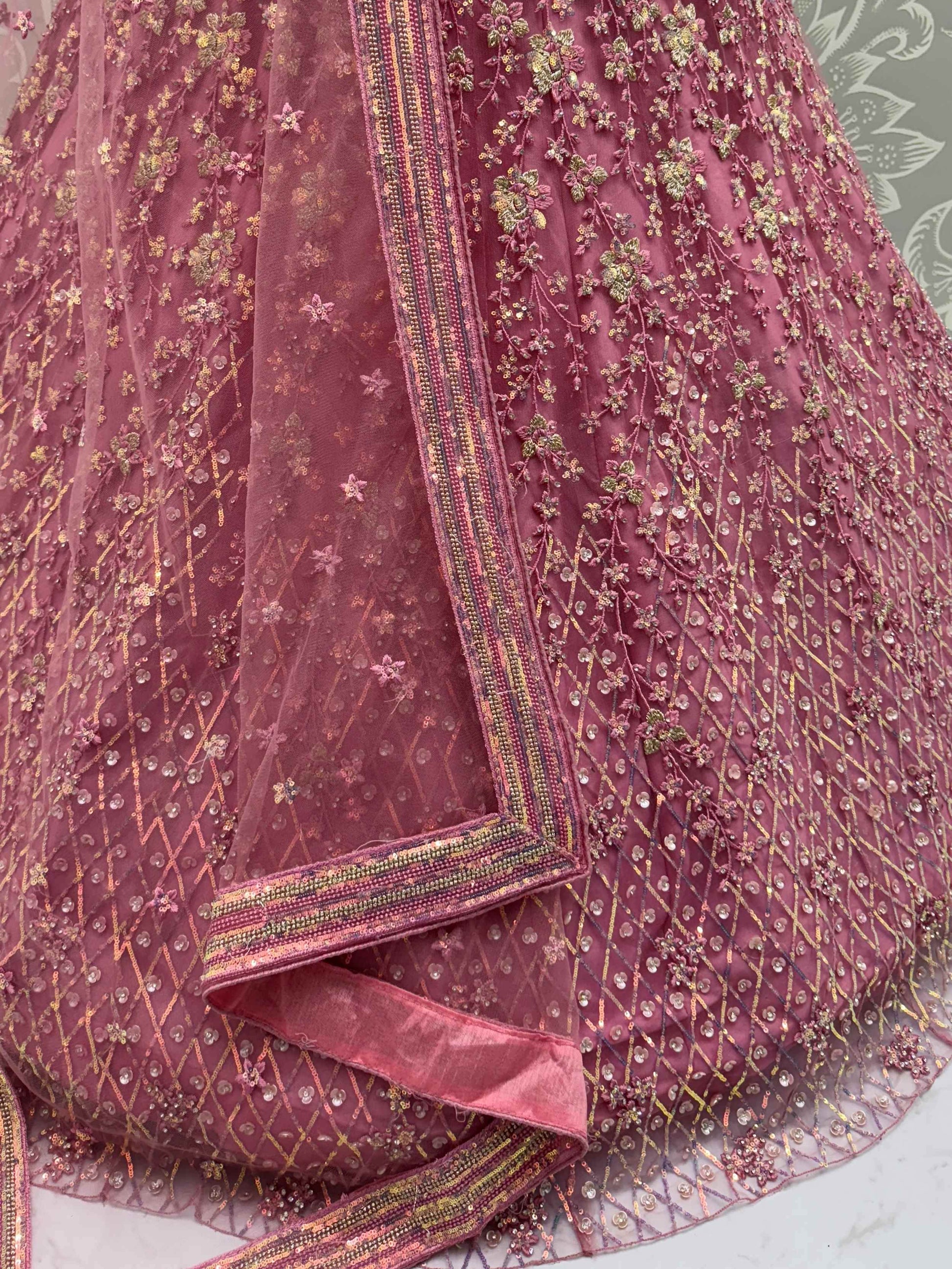 Shiny Pink Multi Thread Work Net Engagement Wear Lehenga With Blouse