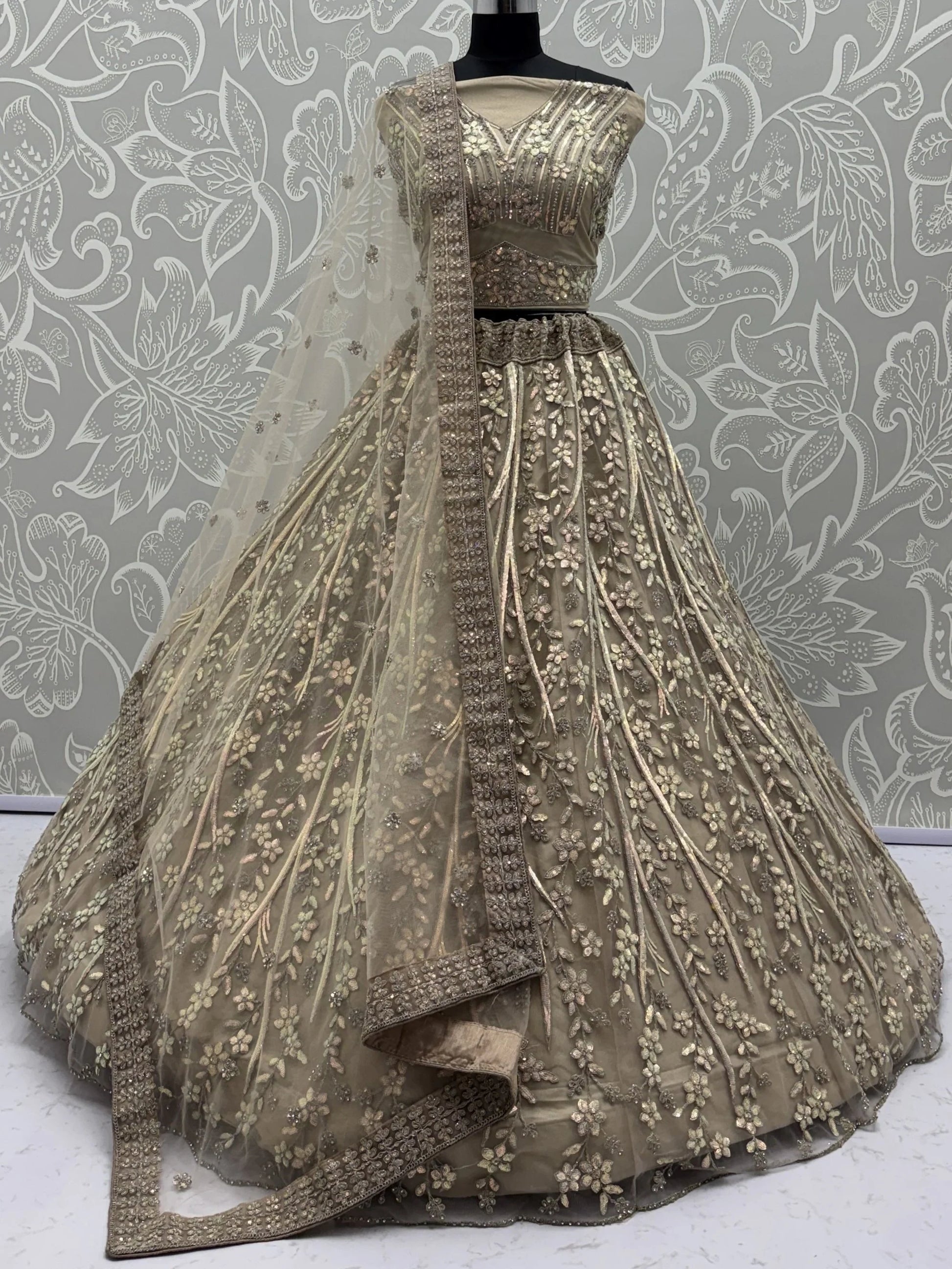 Beautiful Golden Zircon Work Net Sangeet Wear Lehenga Choli With Dupatta