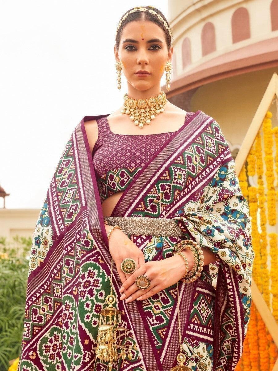 Beautiful Off-White & Purple Patola Printed Silk Events Wear Saree