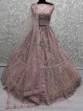 Beautiful Peach Sequins Net Engagement Wear Lehenga Choli - Zeel Clothing