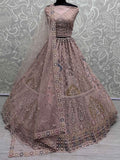 Beautiful Peach Sequins Net Engagement Wear Lehenga Choli - Zeel Clothing