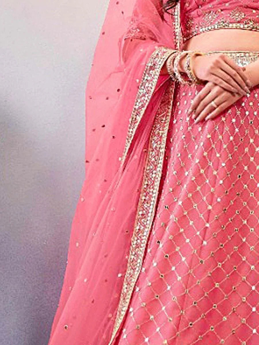 Beautiful Pink Sequins Work Net Wear Lehenga Choli