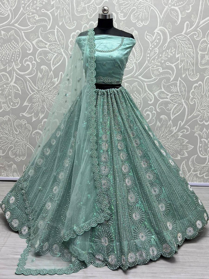 Beautiful Sea Green Sequins Net Reception Wear Lehenga Choli