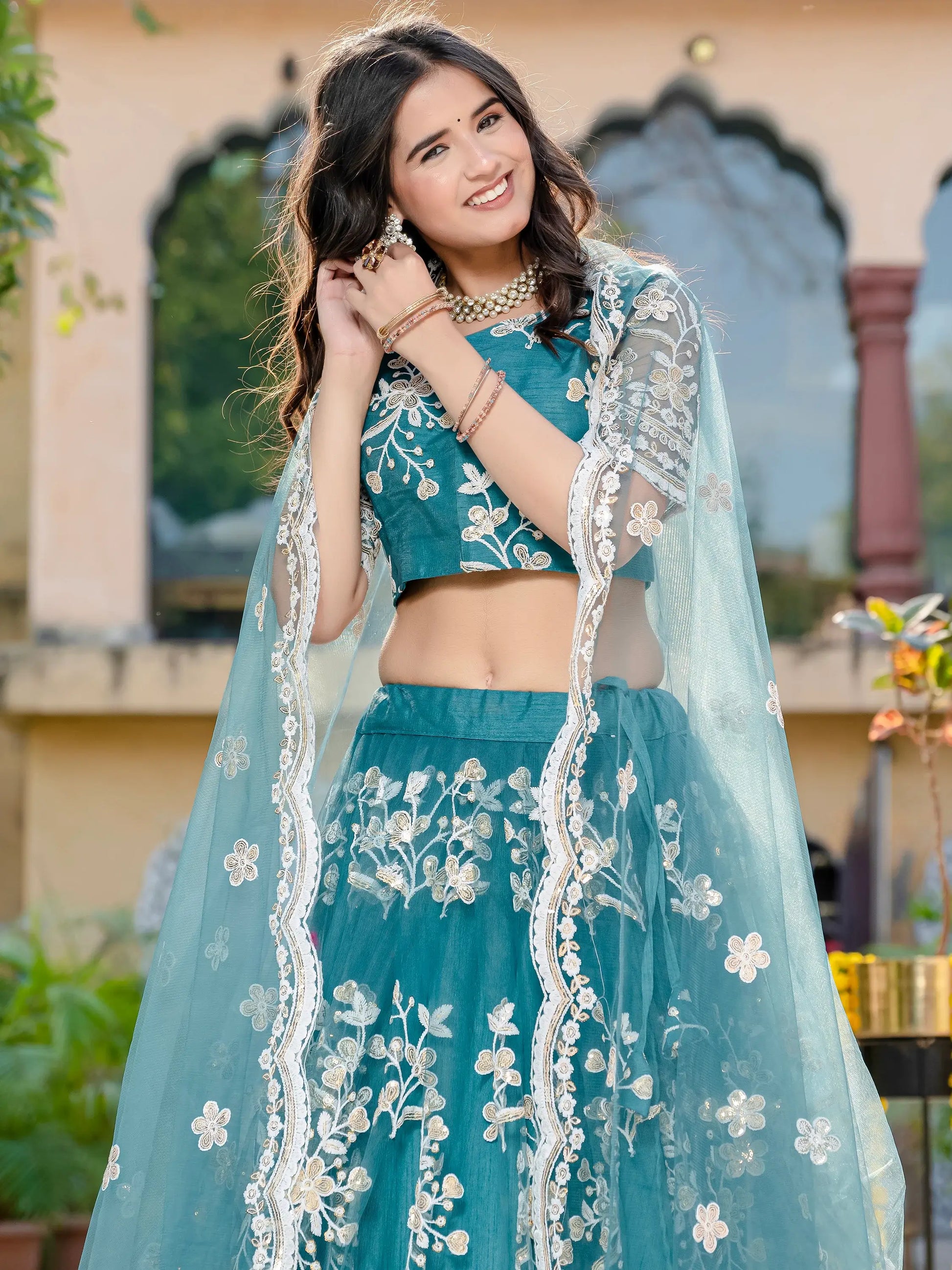 Beautiful Teal Blue Thread Embroidered Net Designer Lehenga Choli - Zeel Clothing