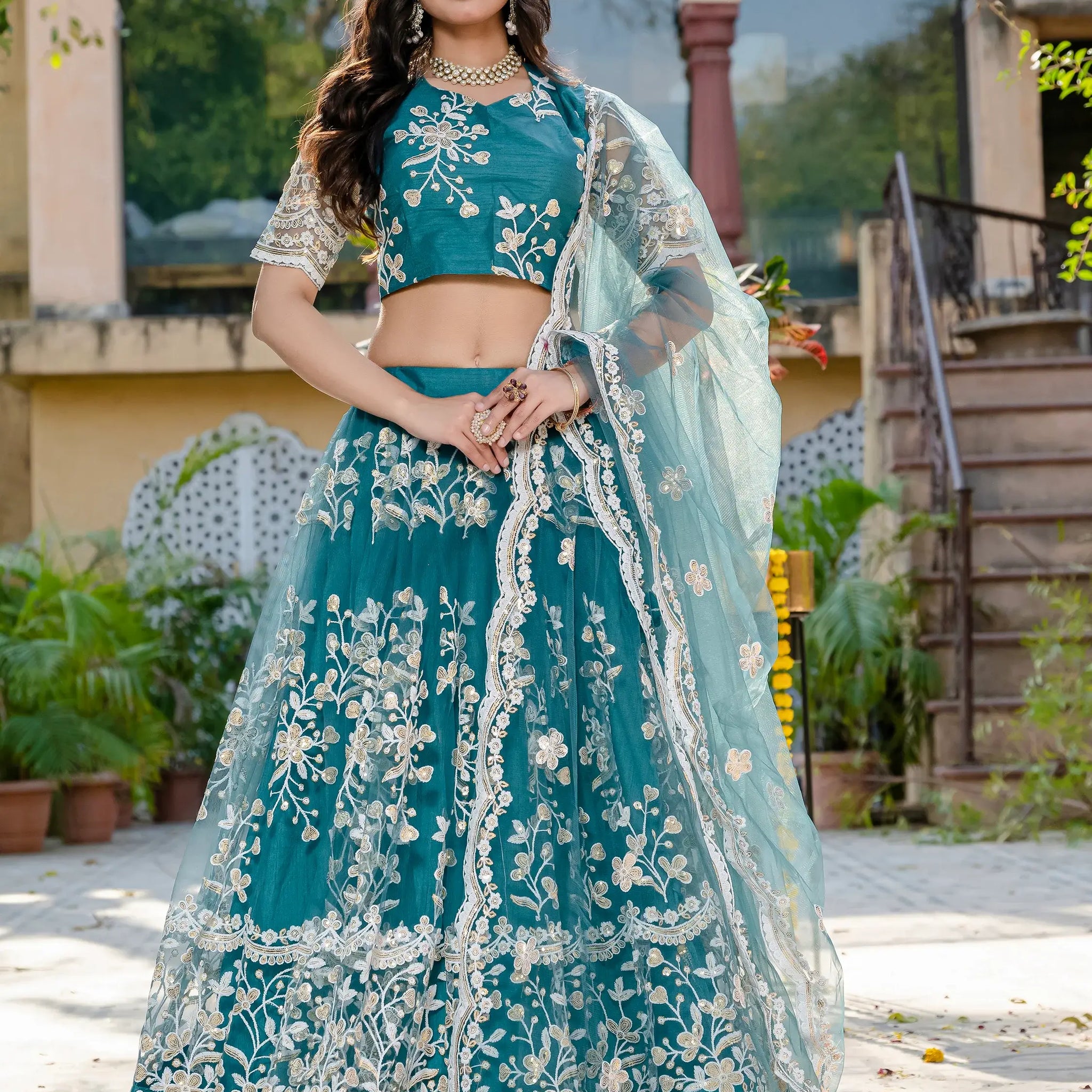 Beautiful Teal Blue Thread Embroidered Net Designer Lehenga Choli - Zeel Clothing