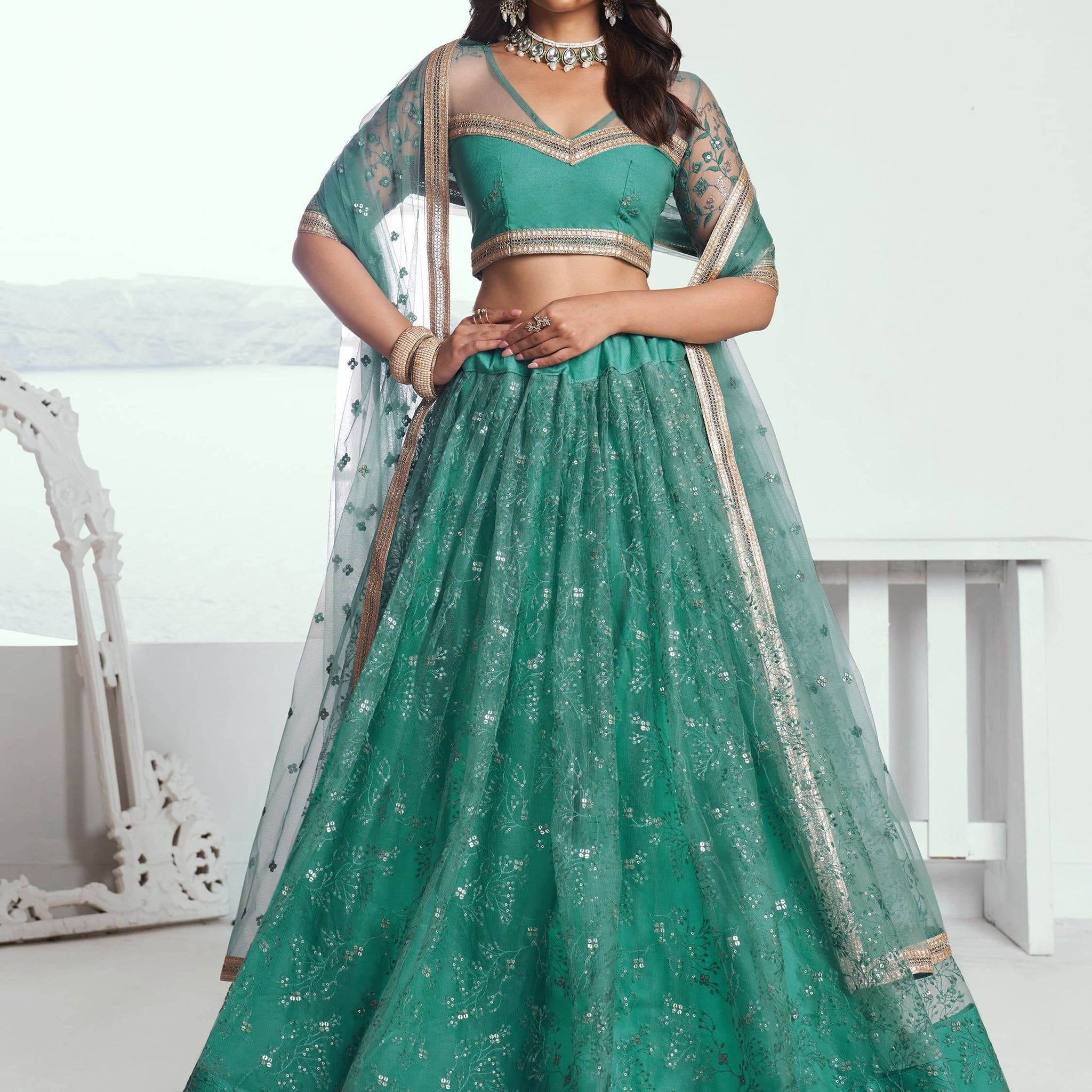 Beautiful Teal Green Embroidered Net Wedding Wear Lehenga Choli - Zeel Clothing