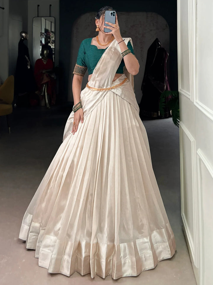 Beautiful White Border Work Silk Onam Special Half Saree Lehenga With Green Blouse