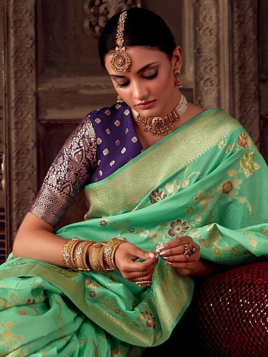 Beguiling Light Green Zari Weaving Georgette Wedding Wear Saree