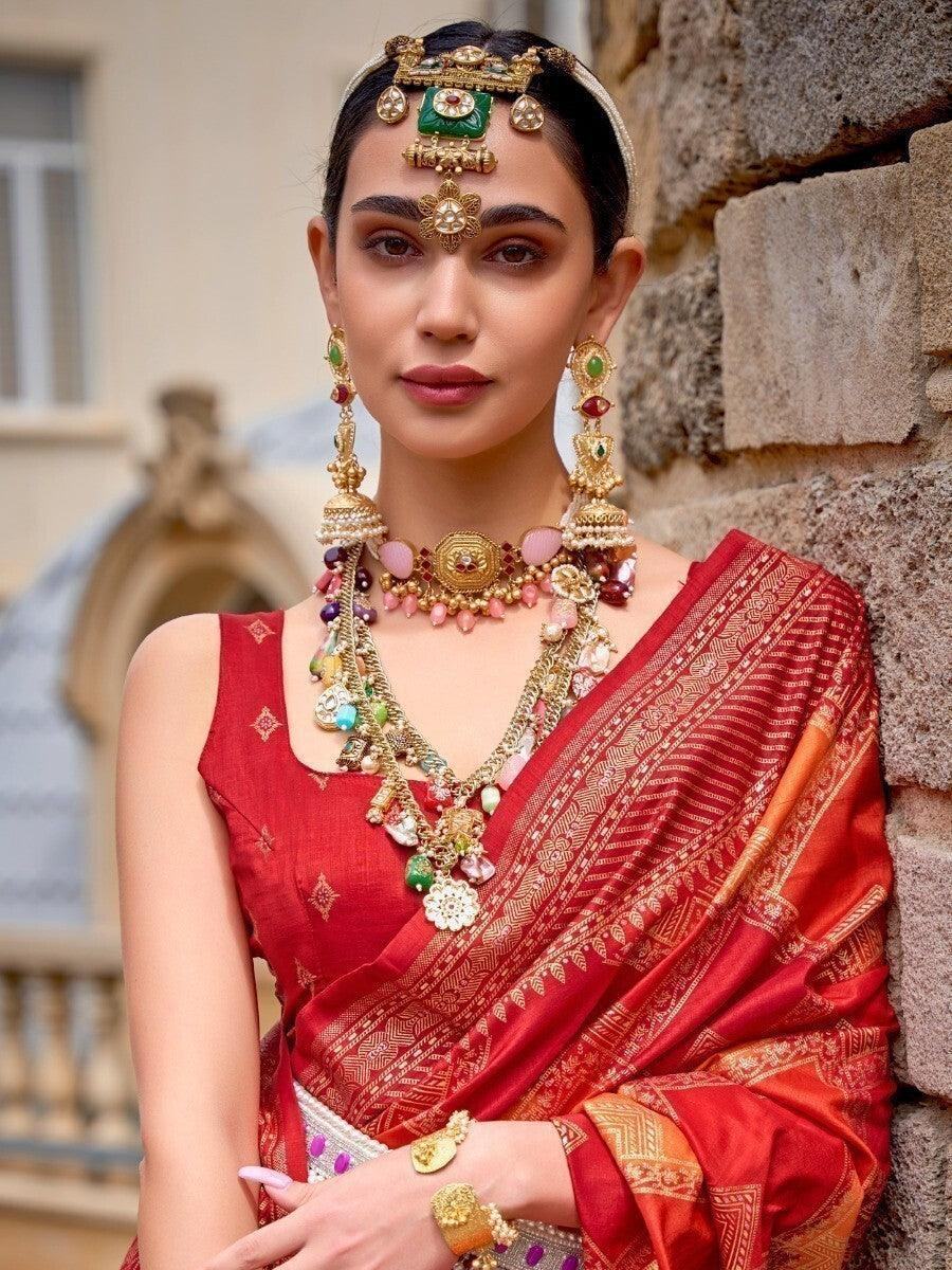 Beguiling Orange Patola Silk Function Wear Saree With Blouse