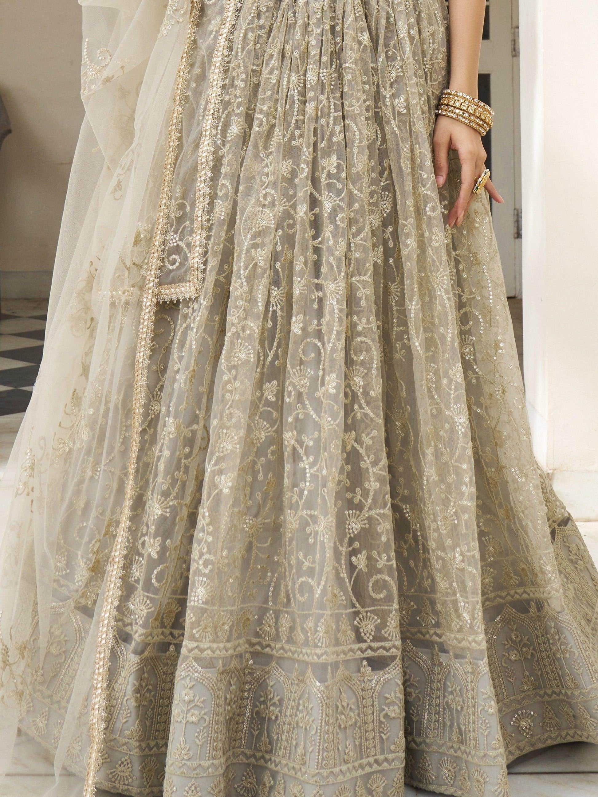 Bewitching Ivory Thread Work Net Engagement Wear Lehenga Choli - Zeel Clothing