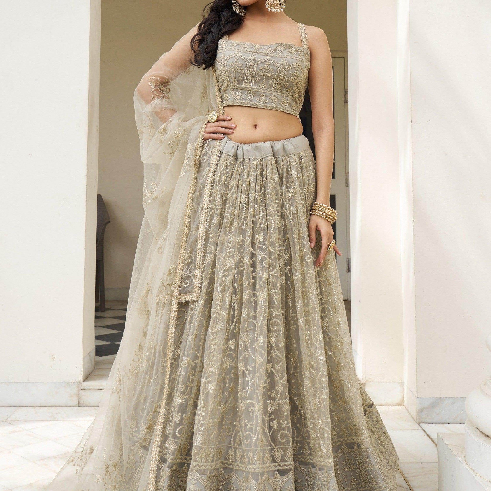 Bewitching Ivory Thread Work Net Engagement Wear Lehenga Choli - Zeel Clothing