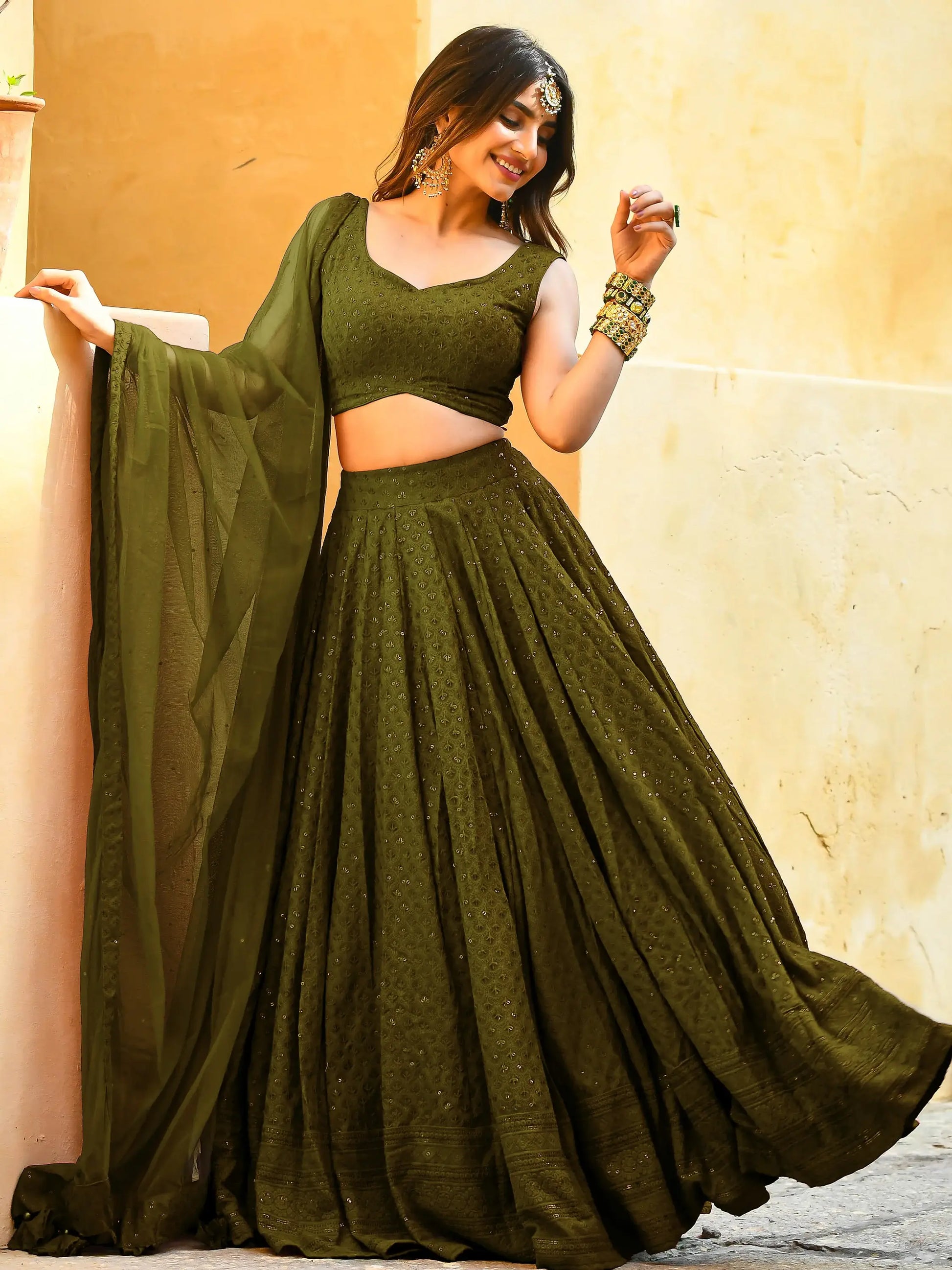 Bewitching Mehendi Green Sequins Georgette Lehenga Choli With Net Dupatta - Zeel Clothing