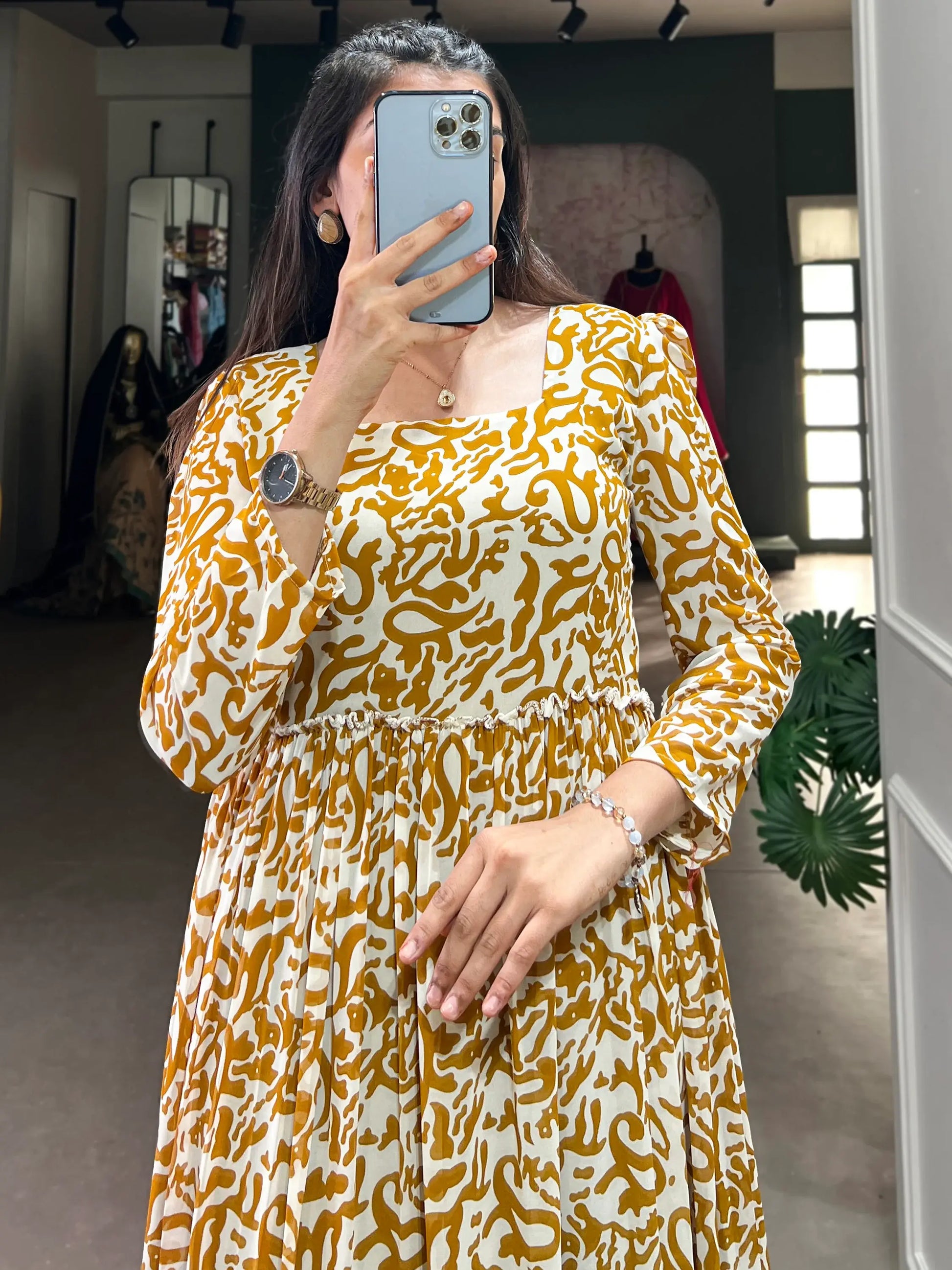 Bewitching Mustard Yellow Digital Printed Georgette Casual Wear Gown - Zeel Clothing