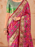 Bewitching Rani Pink Zari Weaving Patola Silk Saree With Blouse