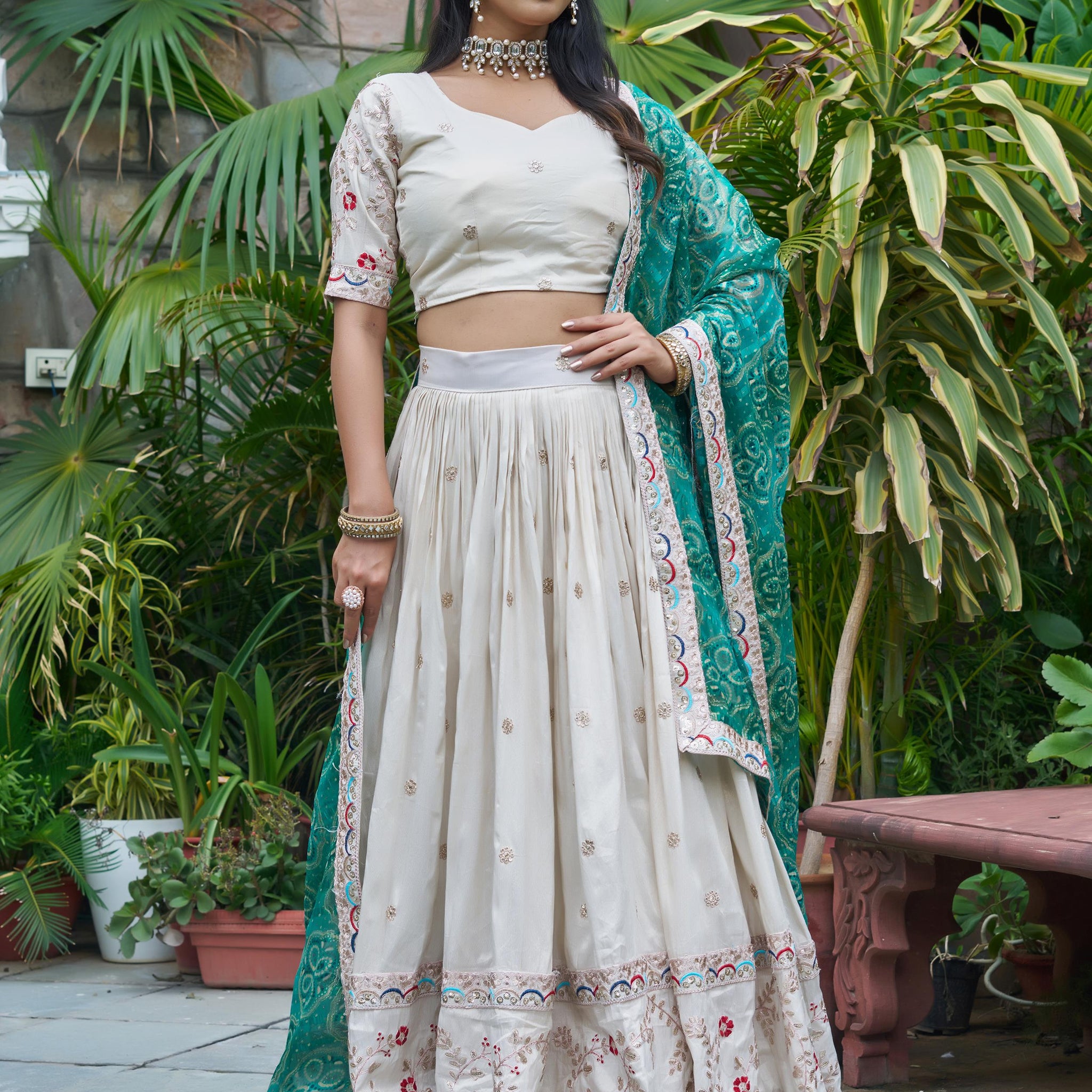 Alluring Off-White Embroidered Silk Lehenga Choli With Teal Dupatta