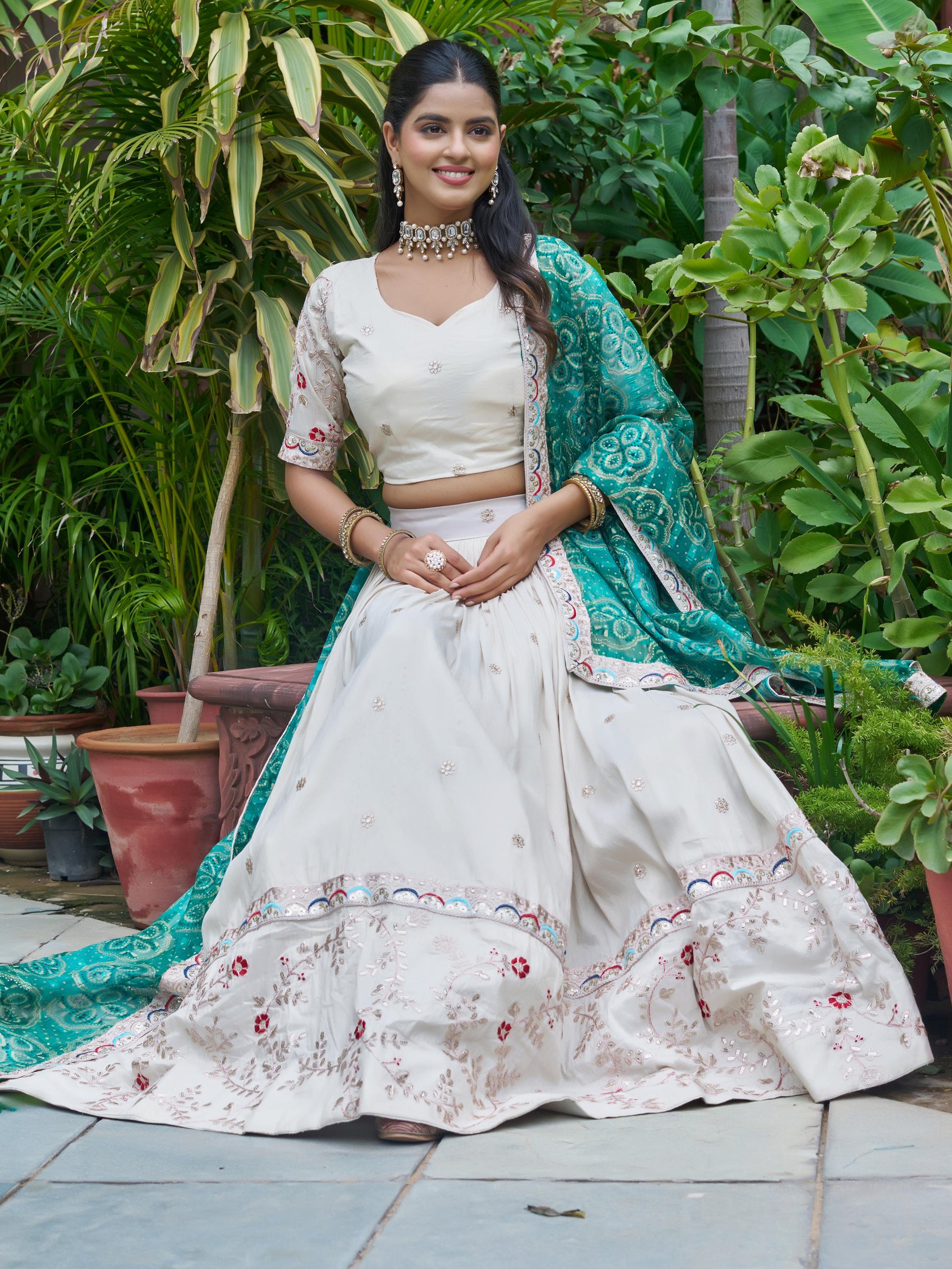 Alluring Off-White Embroidered Silk Lehenga Choli With Teal Dupatta