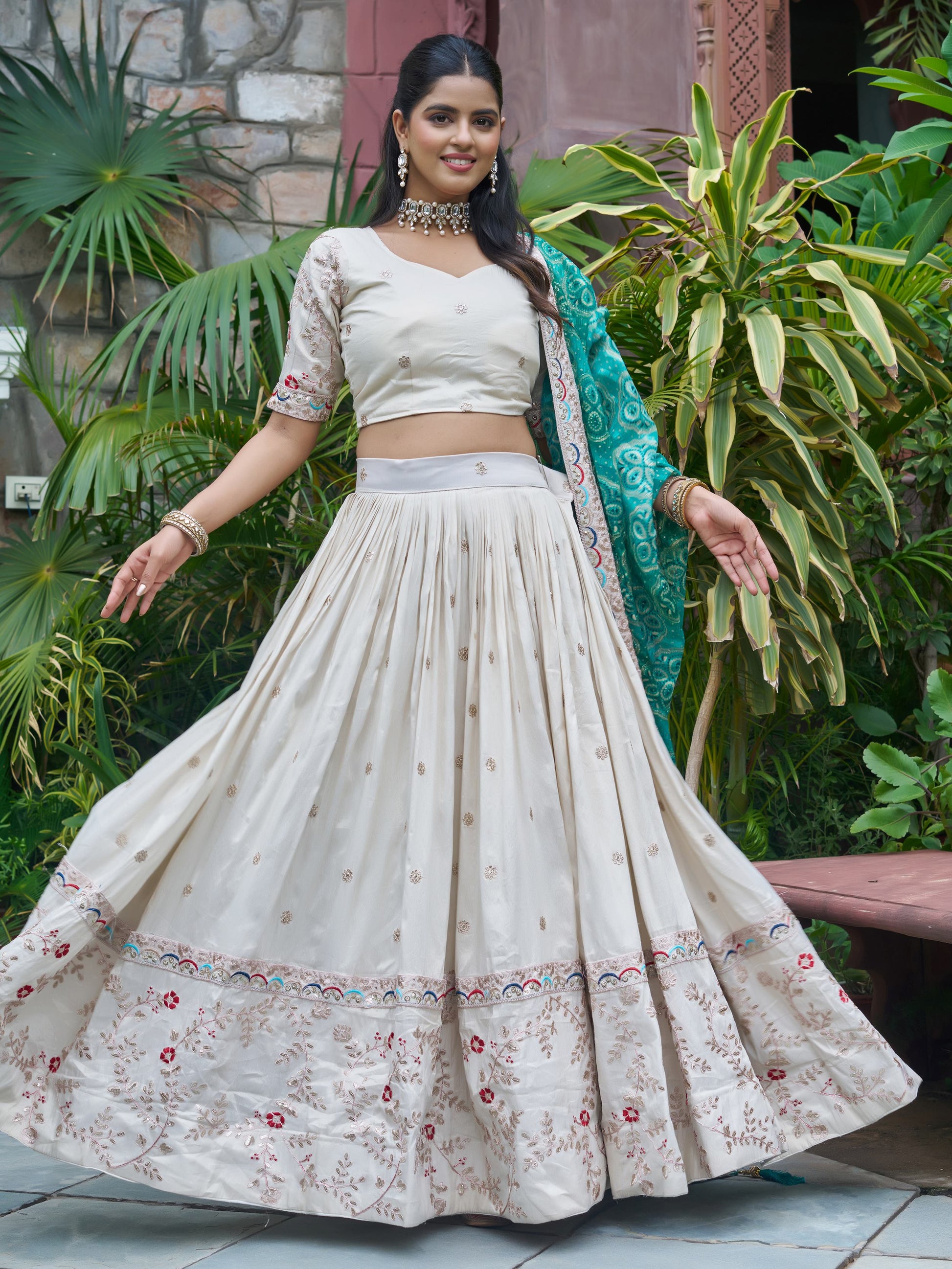 Alluring Off-White Embroidered Silk Lehenga Choli With Teal Dupatta