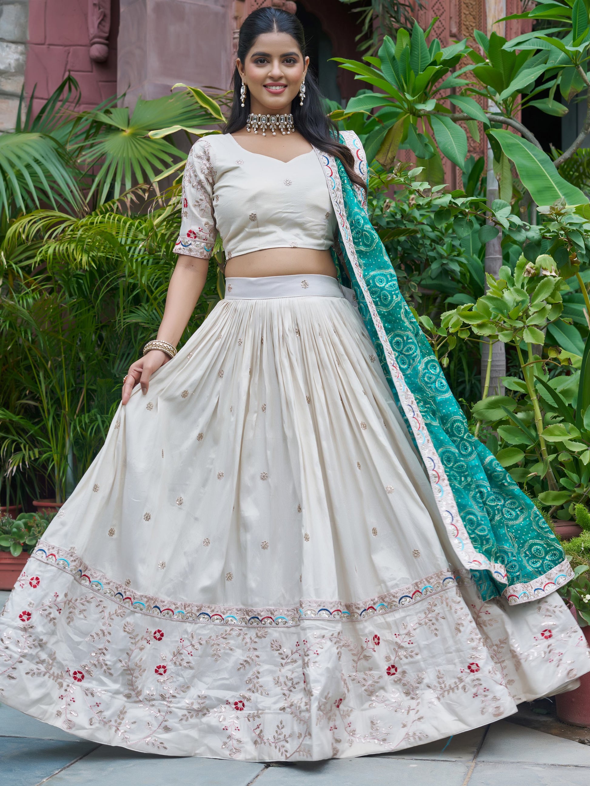 Alluring Off-White Embroidered Silk Lehenga Choli With Teal Dupatta