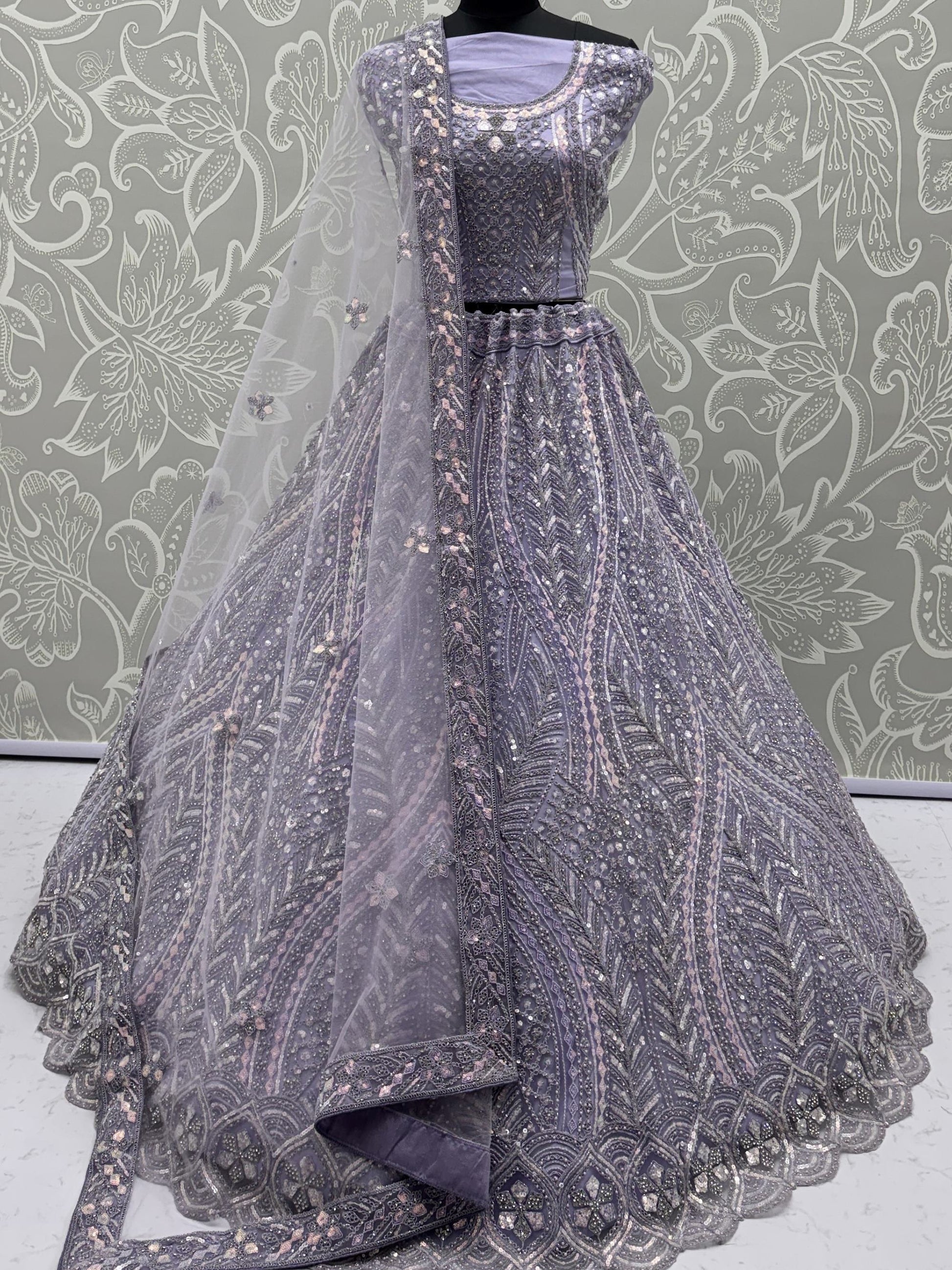 Breathtaking Lavender Thread Work Net Reception Wear Lehenga With Blouse