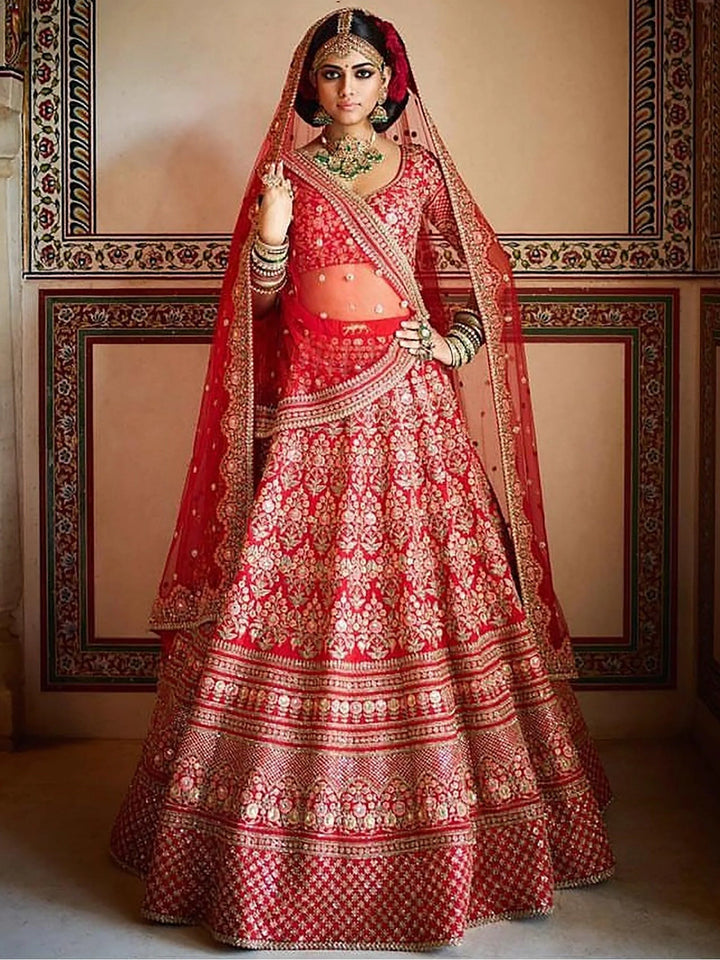 Breathtaking Red Colored Bridal wear Embroidered Lehenga Choli