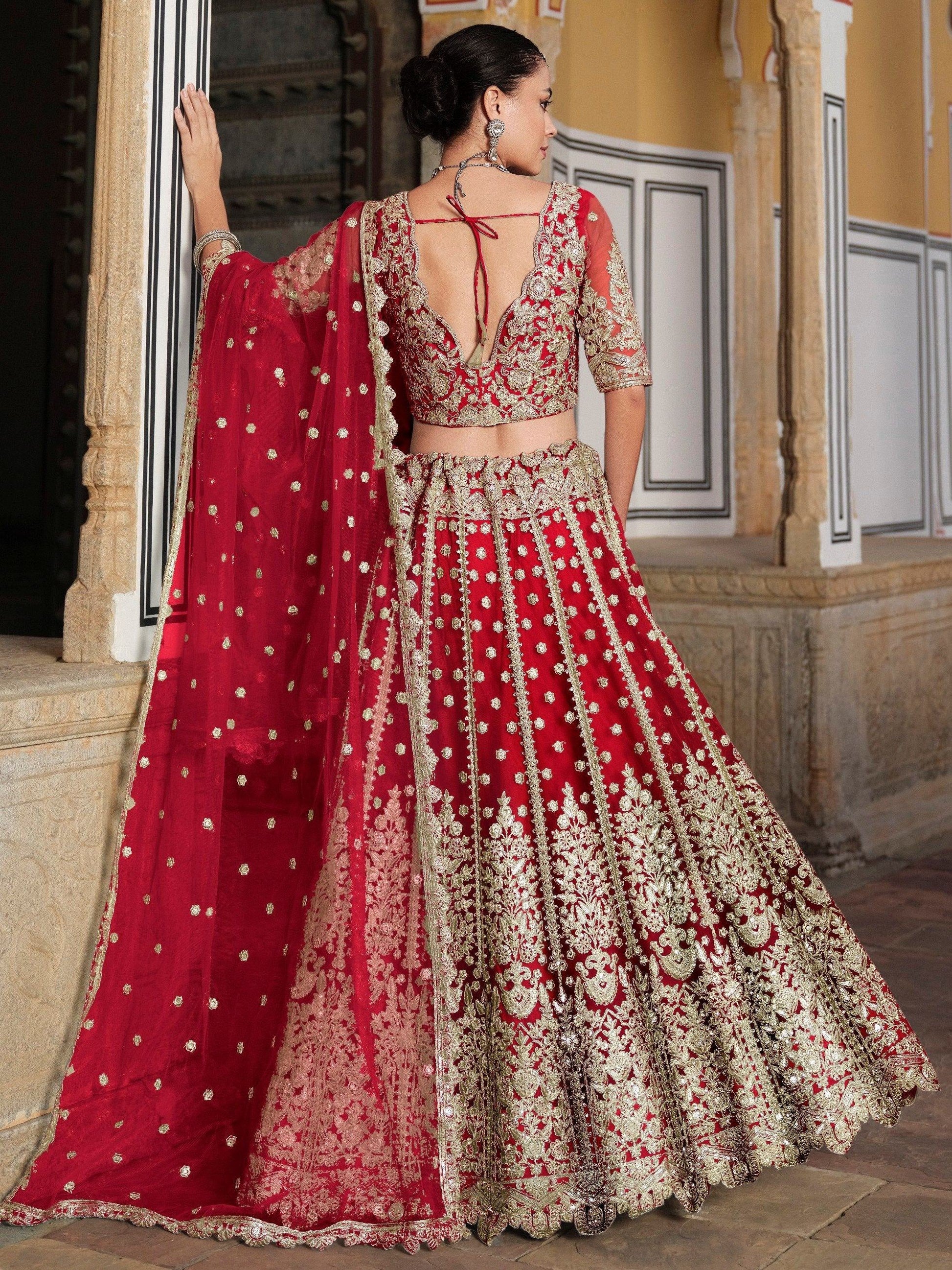 Breathtaking Red Sequins Net Bridal Wear Lehenga Choli With Dupatta