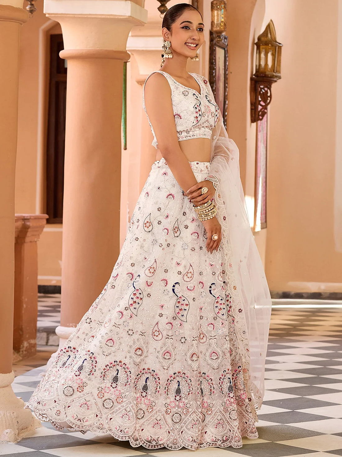 Captivating Cream Floral Embroidery Net Traditional Lehenga Choli With Dupatta