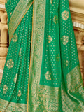 Captivating Green Zari Weaving Dola Silk Festive Wear Saree - Zeel Clothing