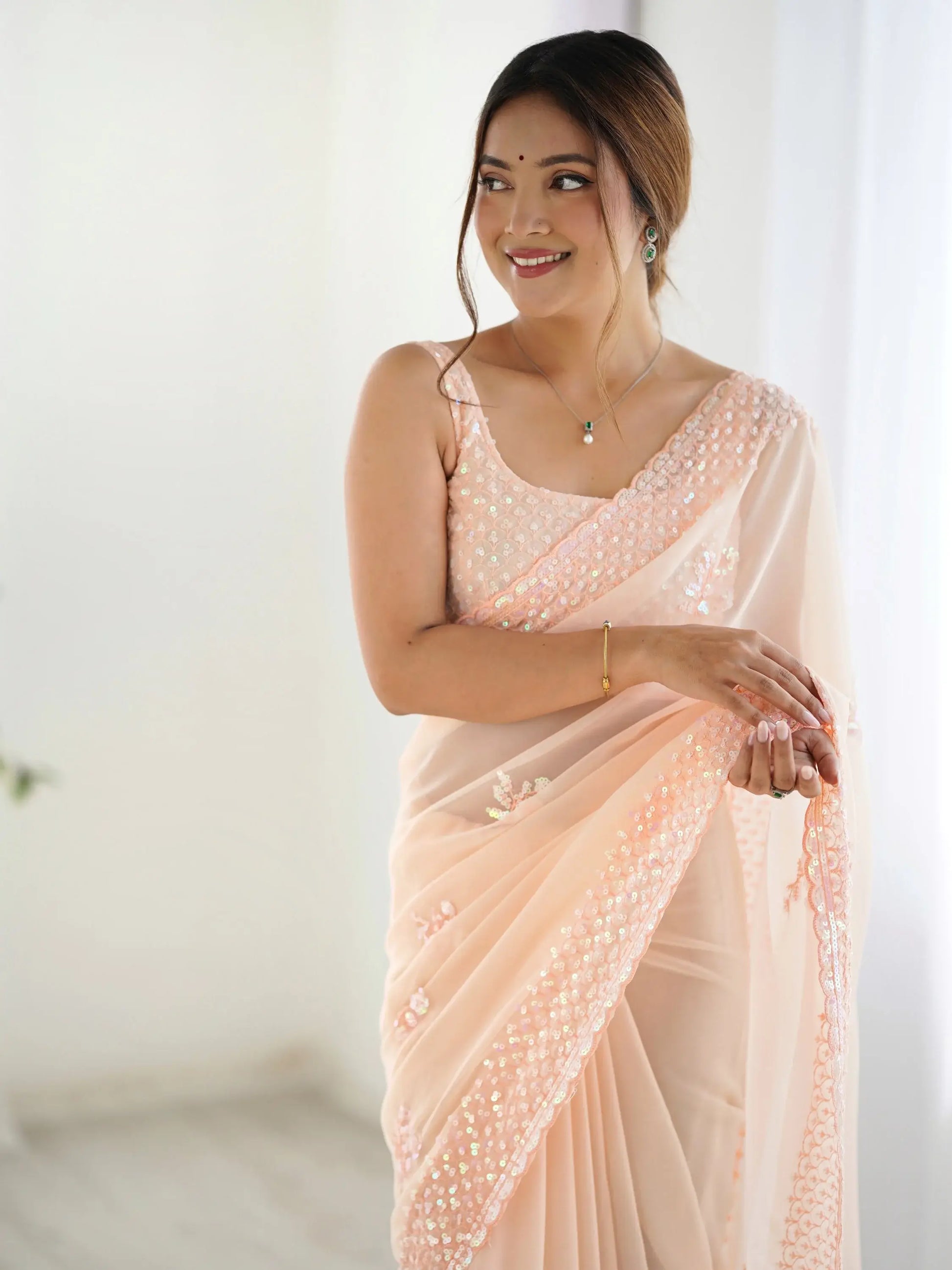 Captivating Peach Sequins Embroidered Georgette Reception Wear Saree - Zeel Clothing