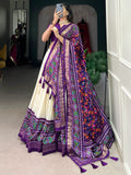 Captivating Purple Patola Printed Tussar Silk Traditional Lehenga Choli - Zeel Clothing