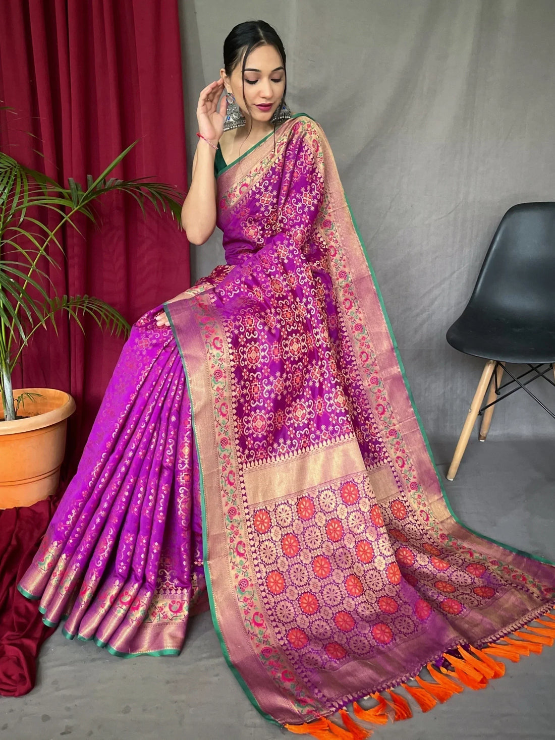 Captivating Purple Zari Weaving Patola Silk Festive Wear Saree