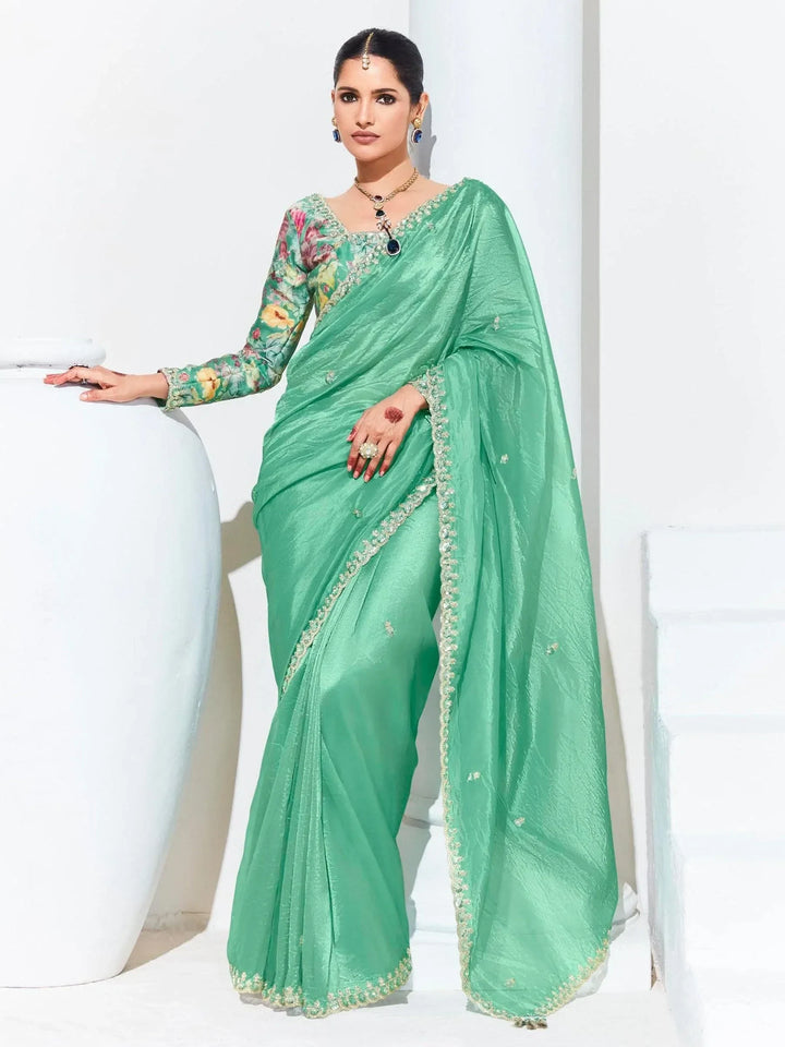 Captivating Teal Green Embroidered Organza Festival Wear Saree