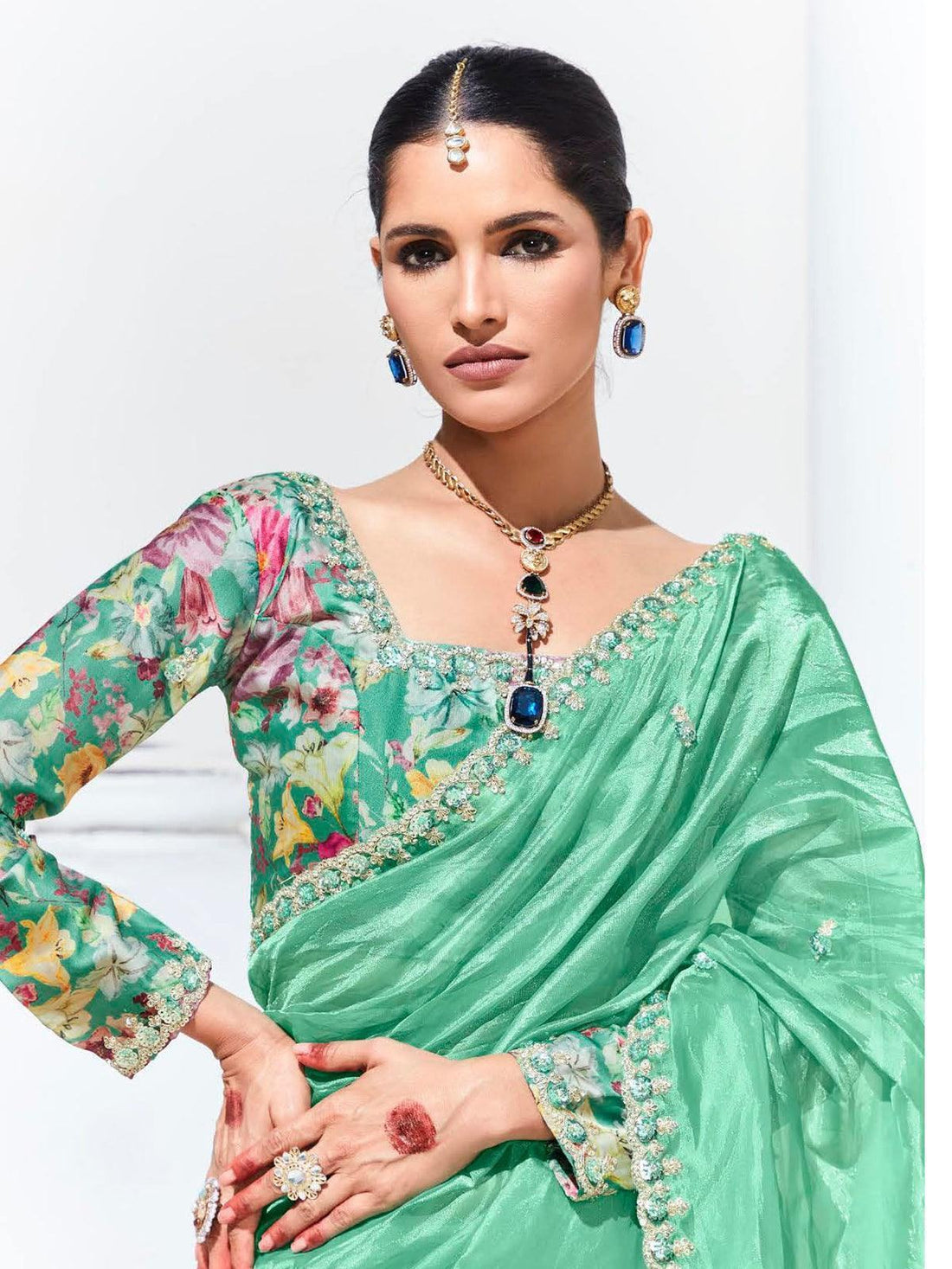 Captivating Teal Green Embroidered Organza Festival Wear Saree