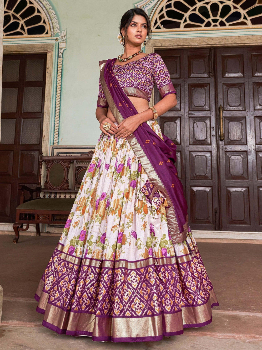 Captivating White & Wine Patola Printed Tussar Silk Lehenga Choli