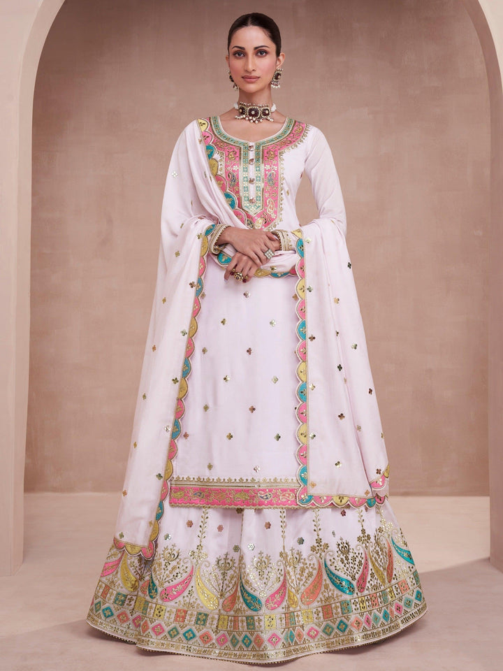 Captivating White Embroidered Silk Lehenga Suit With Dupatta