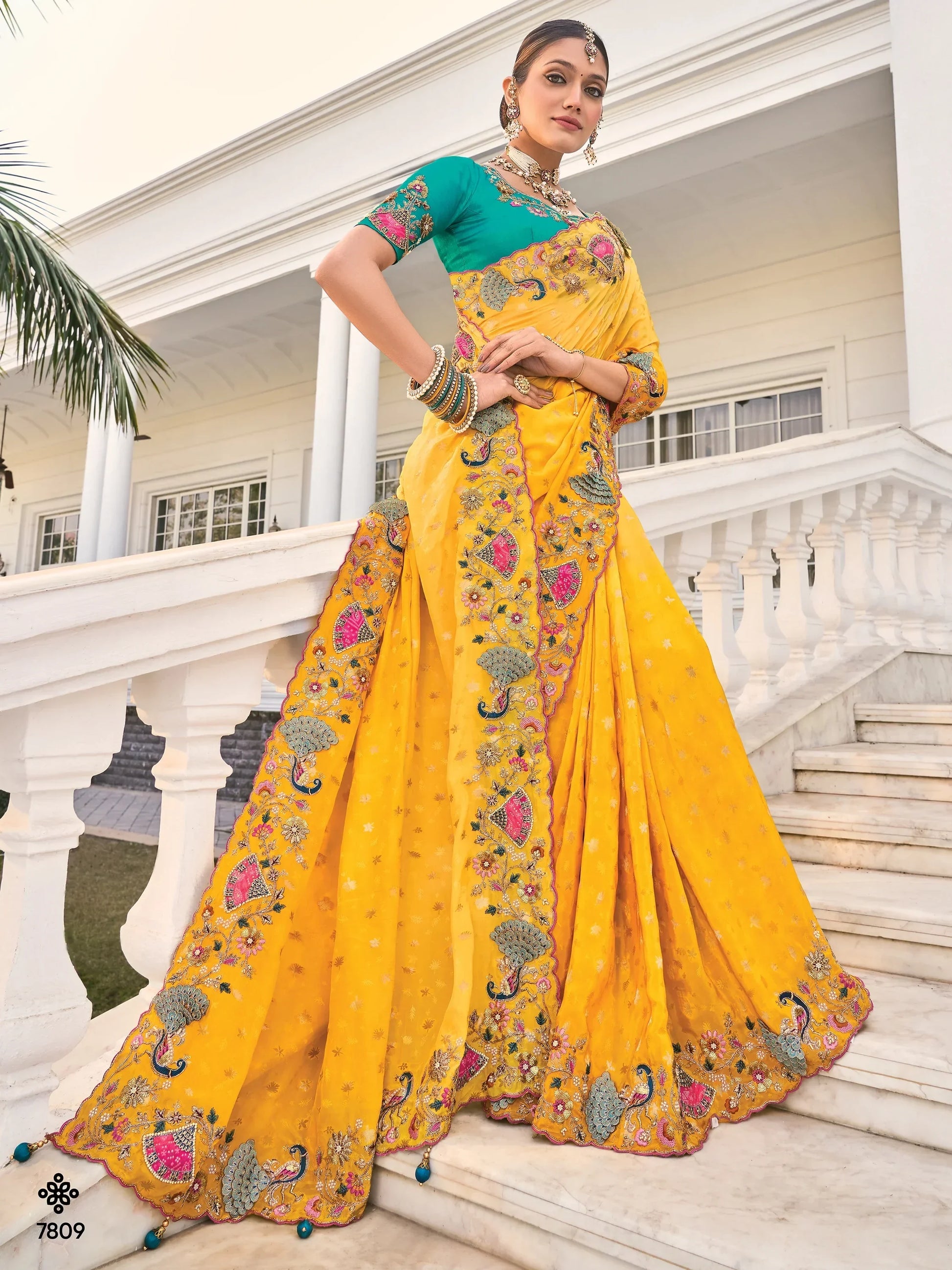 Captivating Yellow Heavy Border Work Crape Silk Wedding Wear Saree - Zeel Clothing