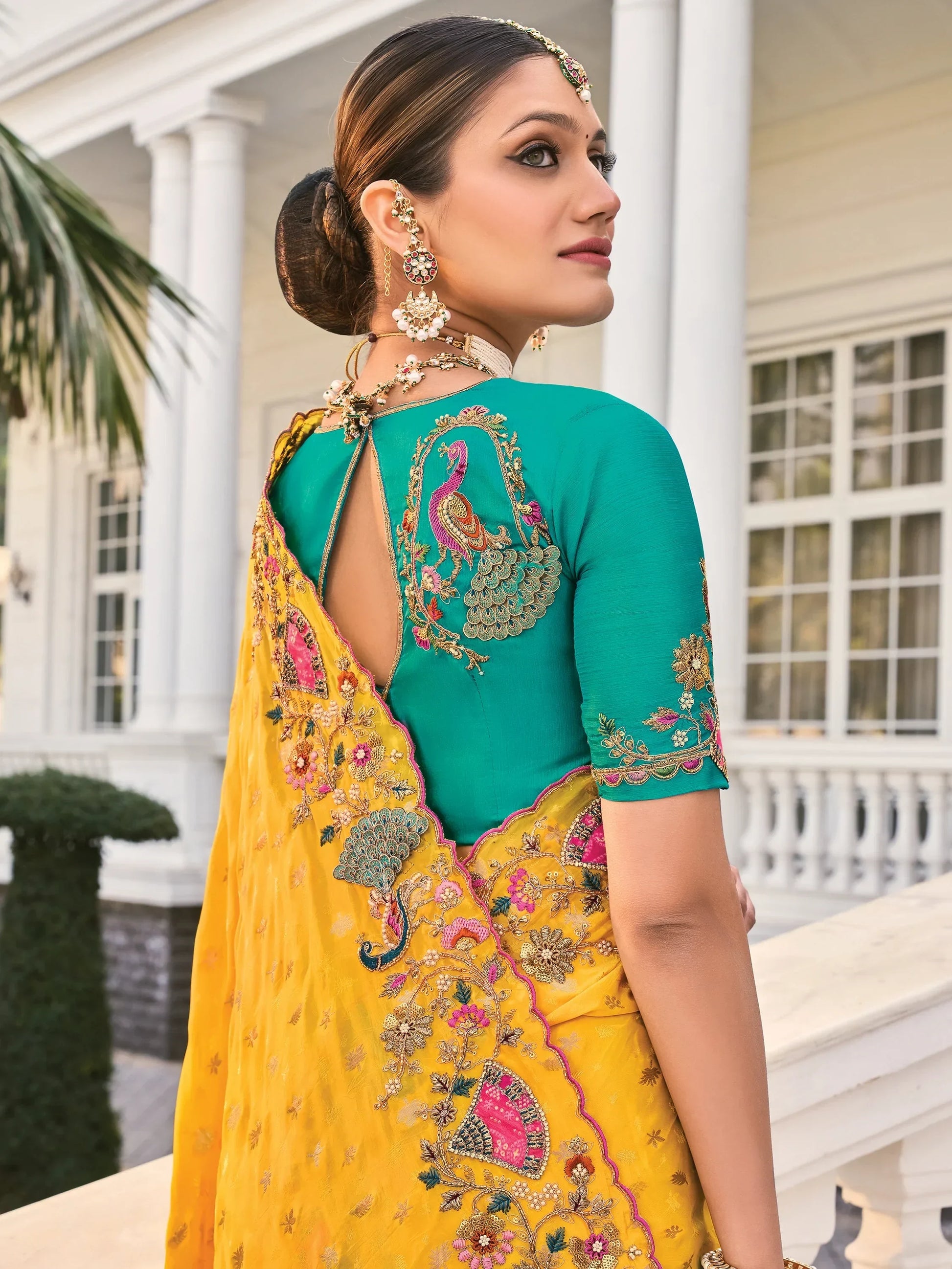 Captivating Yellow Heavy Border Work Crape Silk Wedding Wear Saree - Zeel Clothing