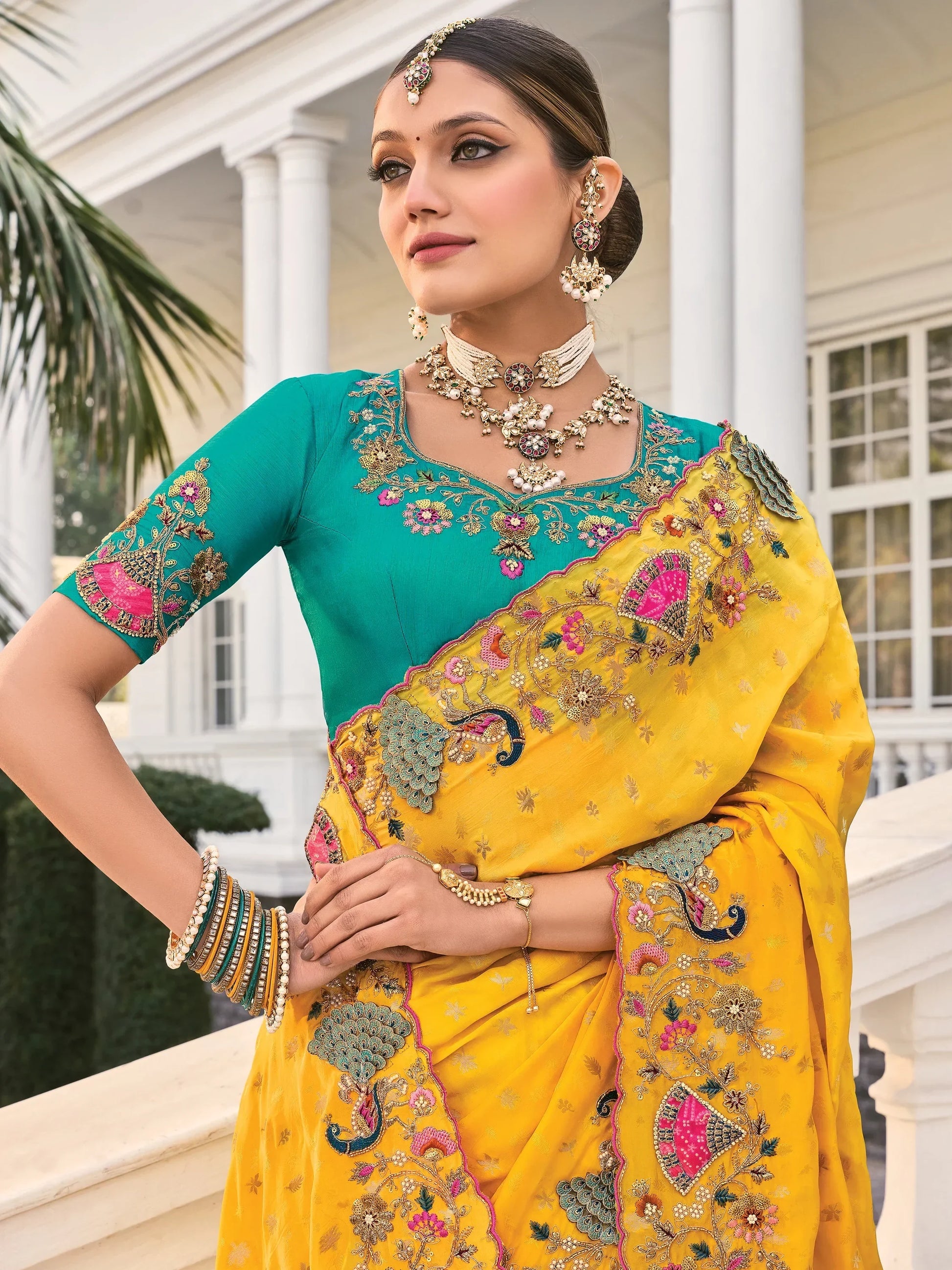 Captivating Yellow Heavy Border Work Crape Silk Wedding Wear Saree - Zeel Clothing