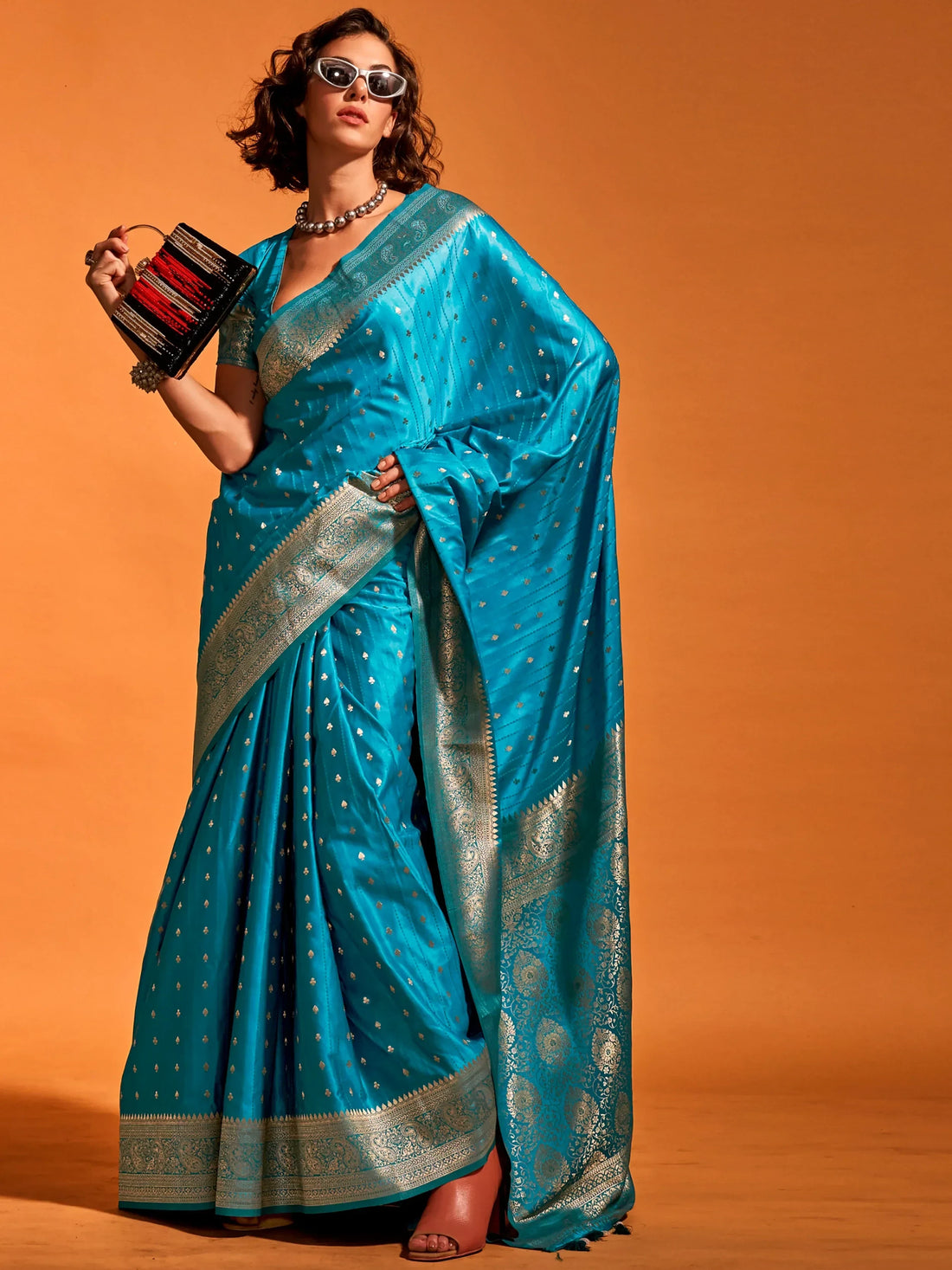 Charming Blue Zari Weaving Satin Reception Wear Saree With Blouse - Zeel Clothing