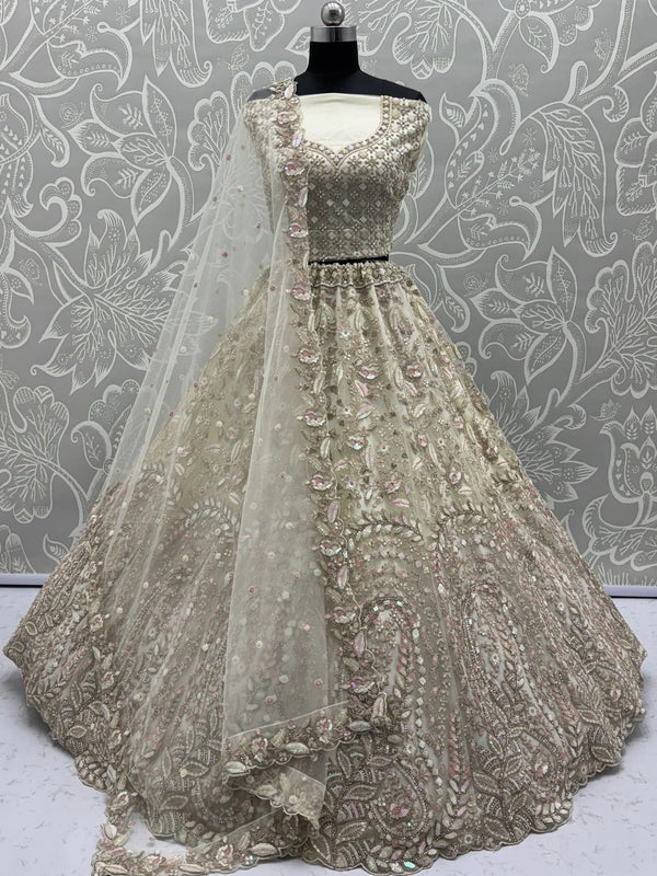 Charming Cream Zircon Work Net Bridesmaid Lehenga Choli With Dupatta - Zeel Clothing