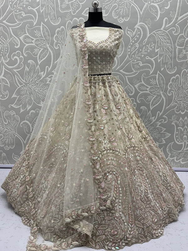 Charming Cream Zircon Work Net Bridesmaid Lehenga Choli With Dupatta - Zeel Clothing