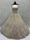 Charming Cream Zircon Work Net Bridesmaid Lehenga Choli With Dupatta - Zeel Clothing